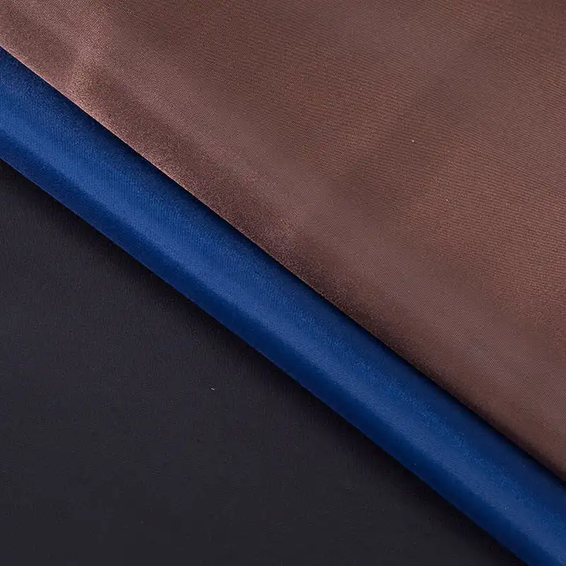 Çevre koruma gereksinimleri altında kompozit polyester kumaşların geliştirme eğilimi nedir?